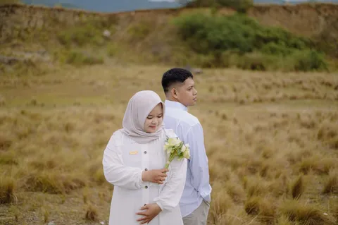 Foto sampul undangan Rusli & Opi