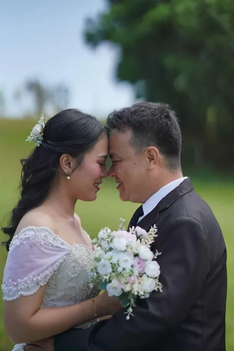 Foto sampul undangan Ade & Jenni