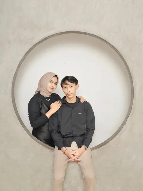 Foto sampul undangan Dina Agustina & Ibnu Ambiya Usman Fazri