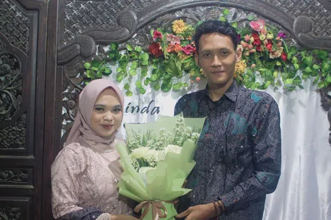 Foto sampul undangan Fauzi & Linda