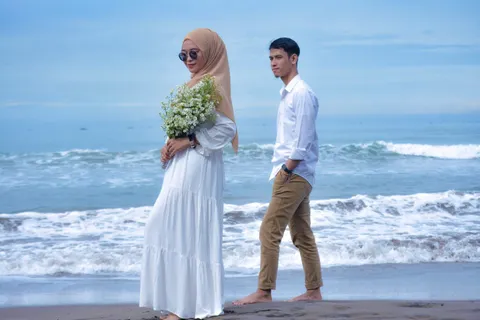 Foto sampul undangan Muharam & Merfina
